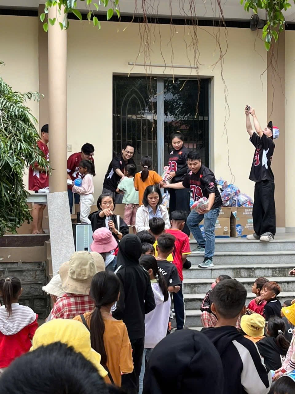 Red Buffalo Hub team delivering holiday gifts to local children